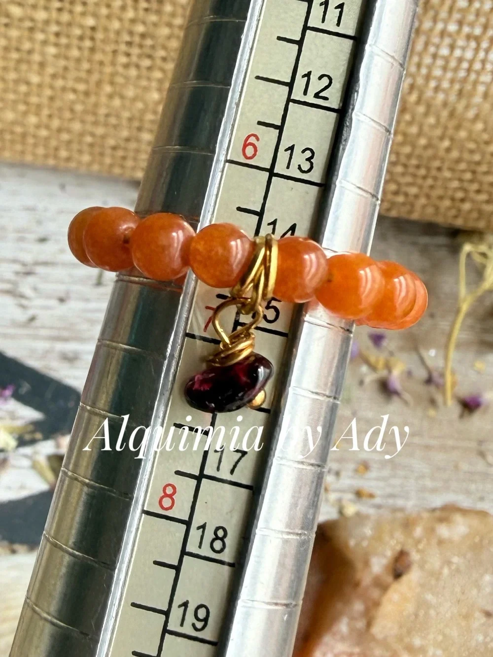 Orange carnelian Beaded Ring with Gold Accents and Dark garnet Charm
